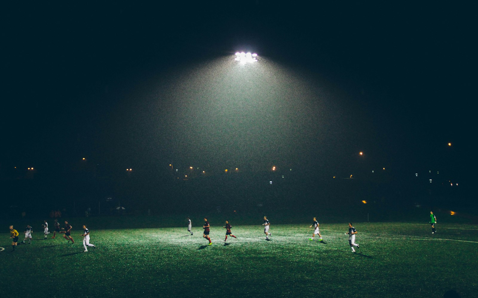 Athletes competing on a sports field